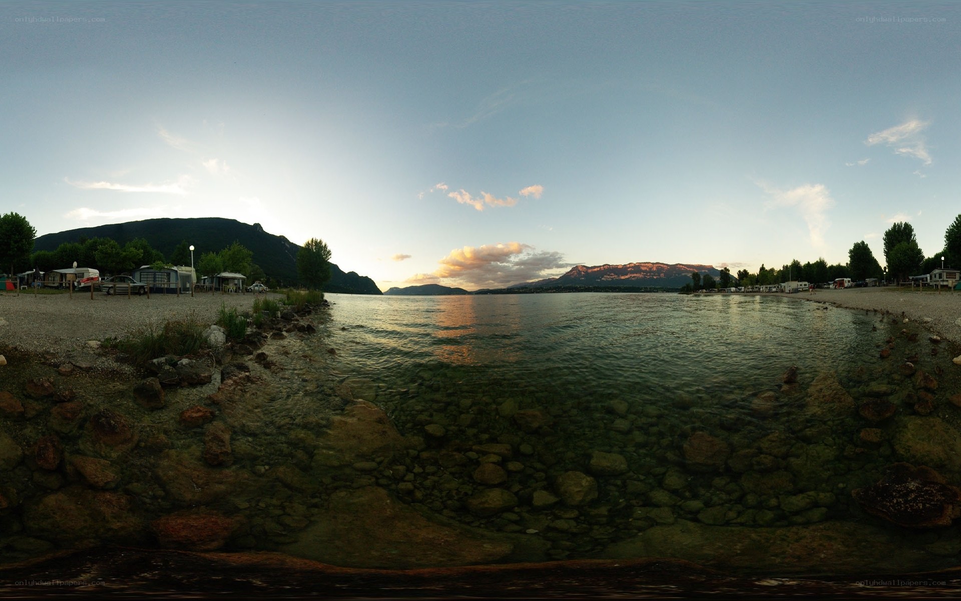 Lake with mountains at sunset