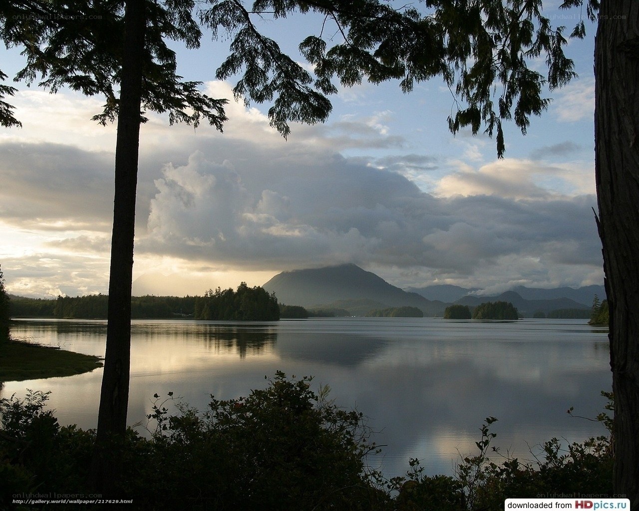 Lake with mountains at sunset