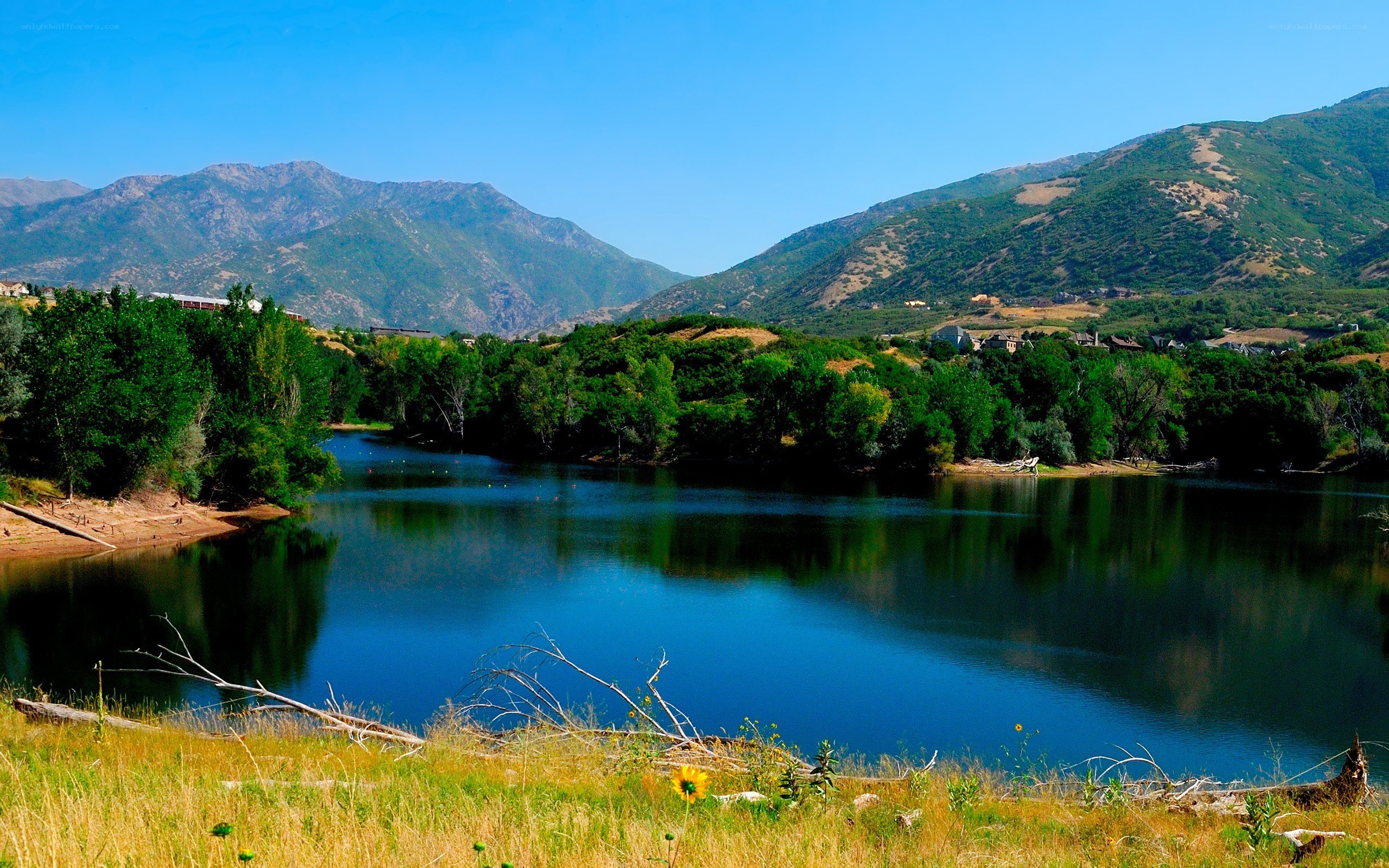 Lake with mountains in background