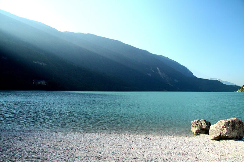 Lake with mountains in background