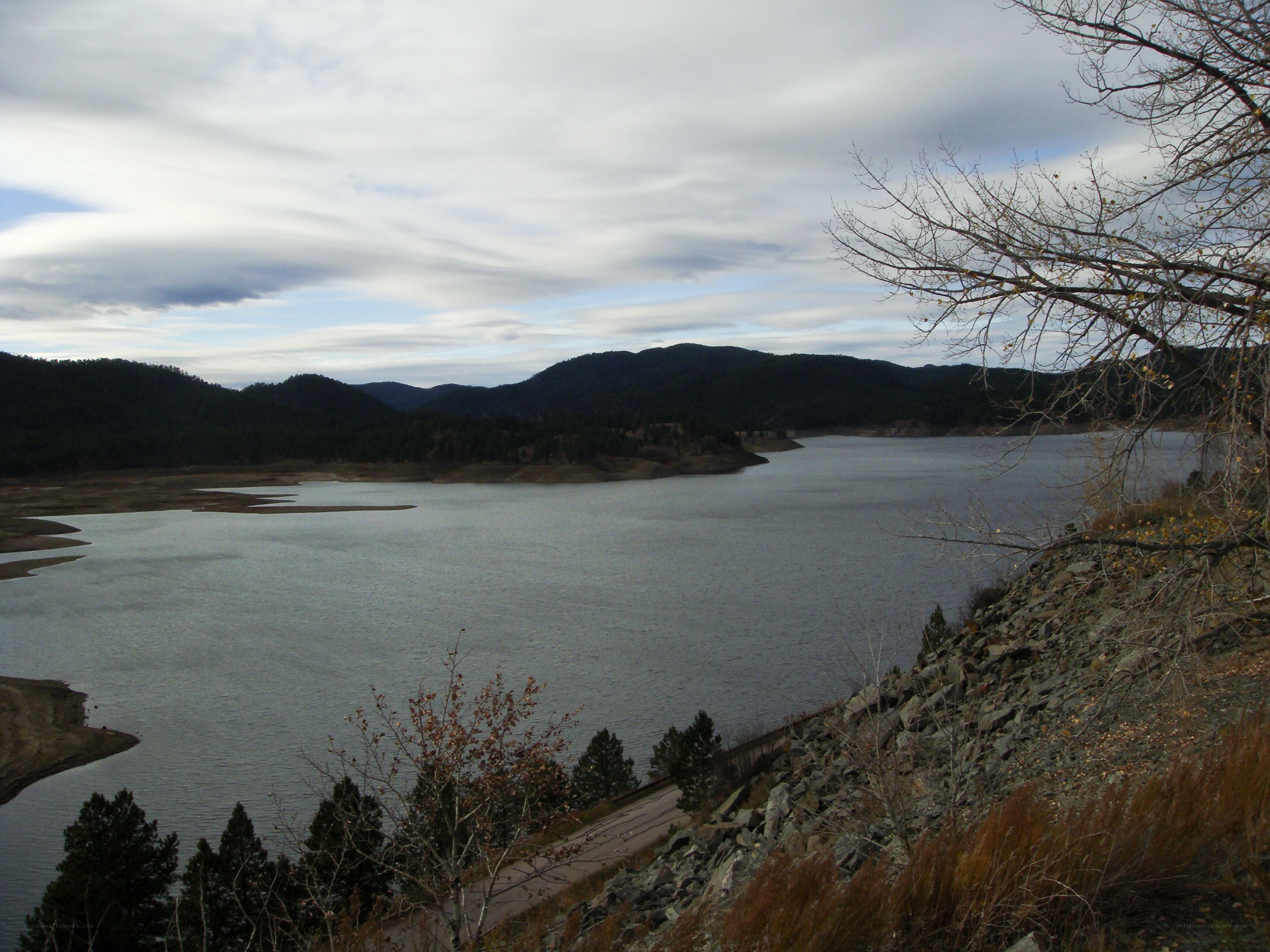Lake with mountains in background