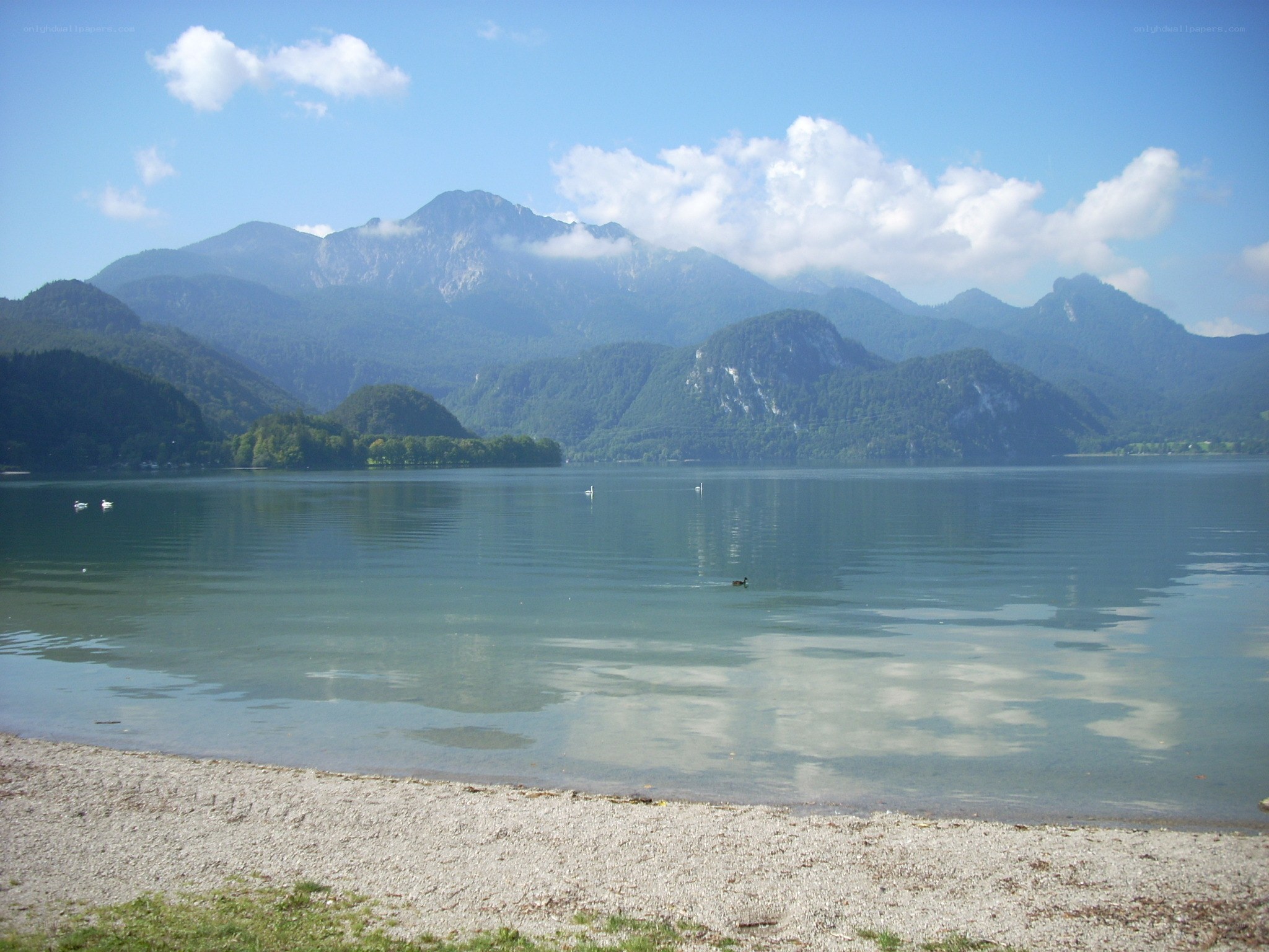 Lake with mountains in background