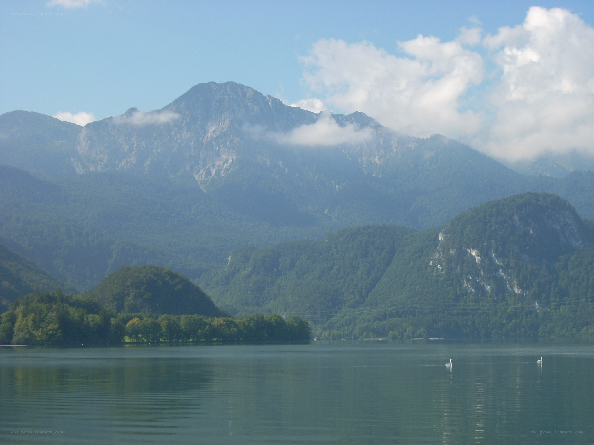 Lake with mountains in background