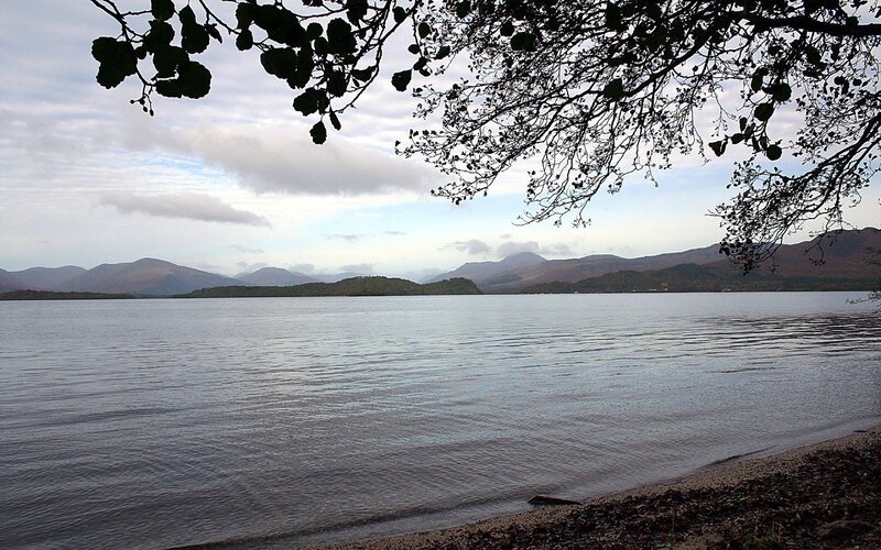 Lake with mountains in background