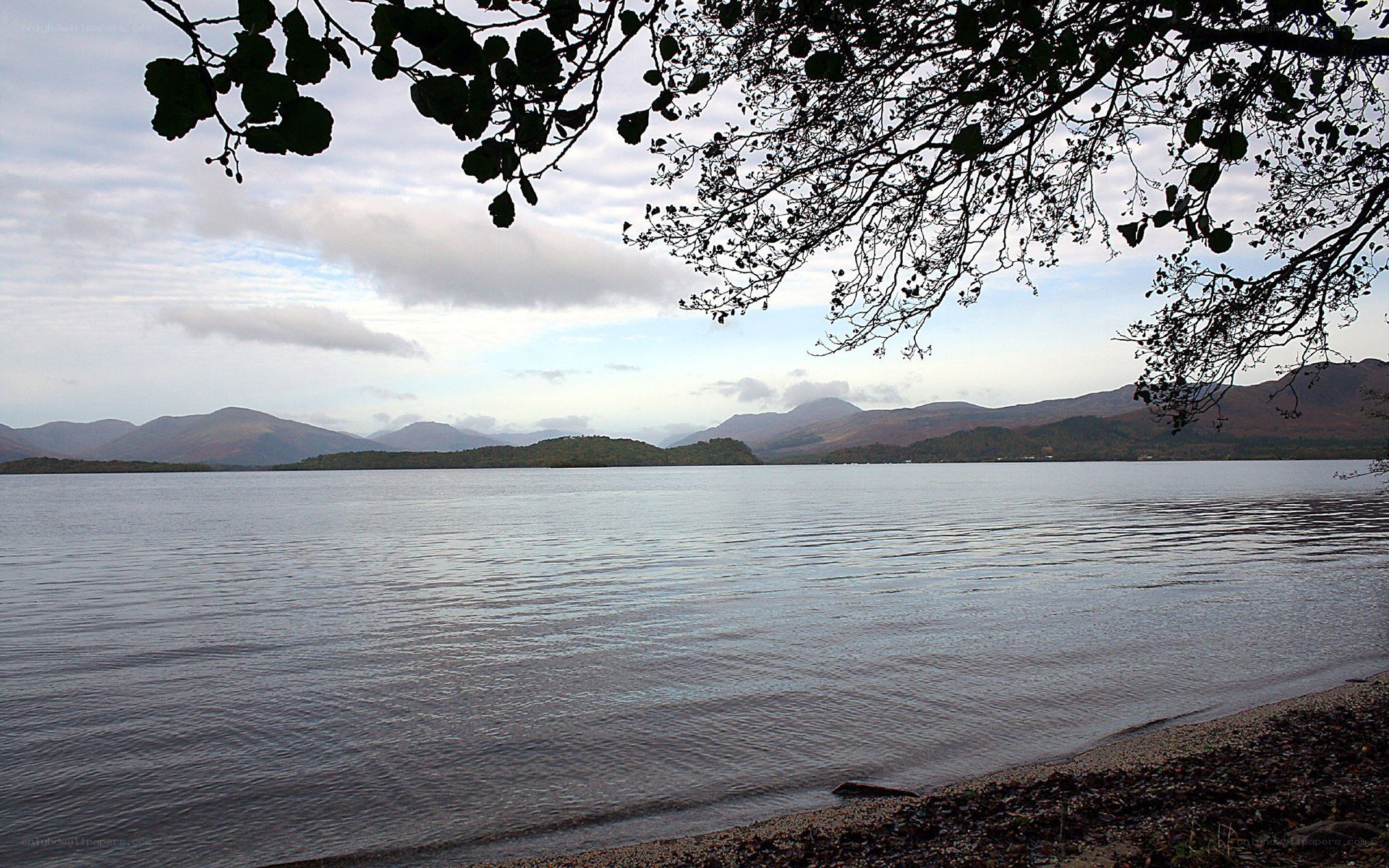 Lake with mountains in background