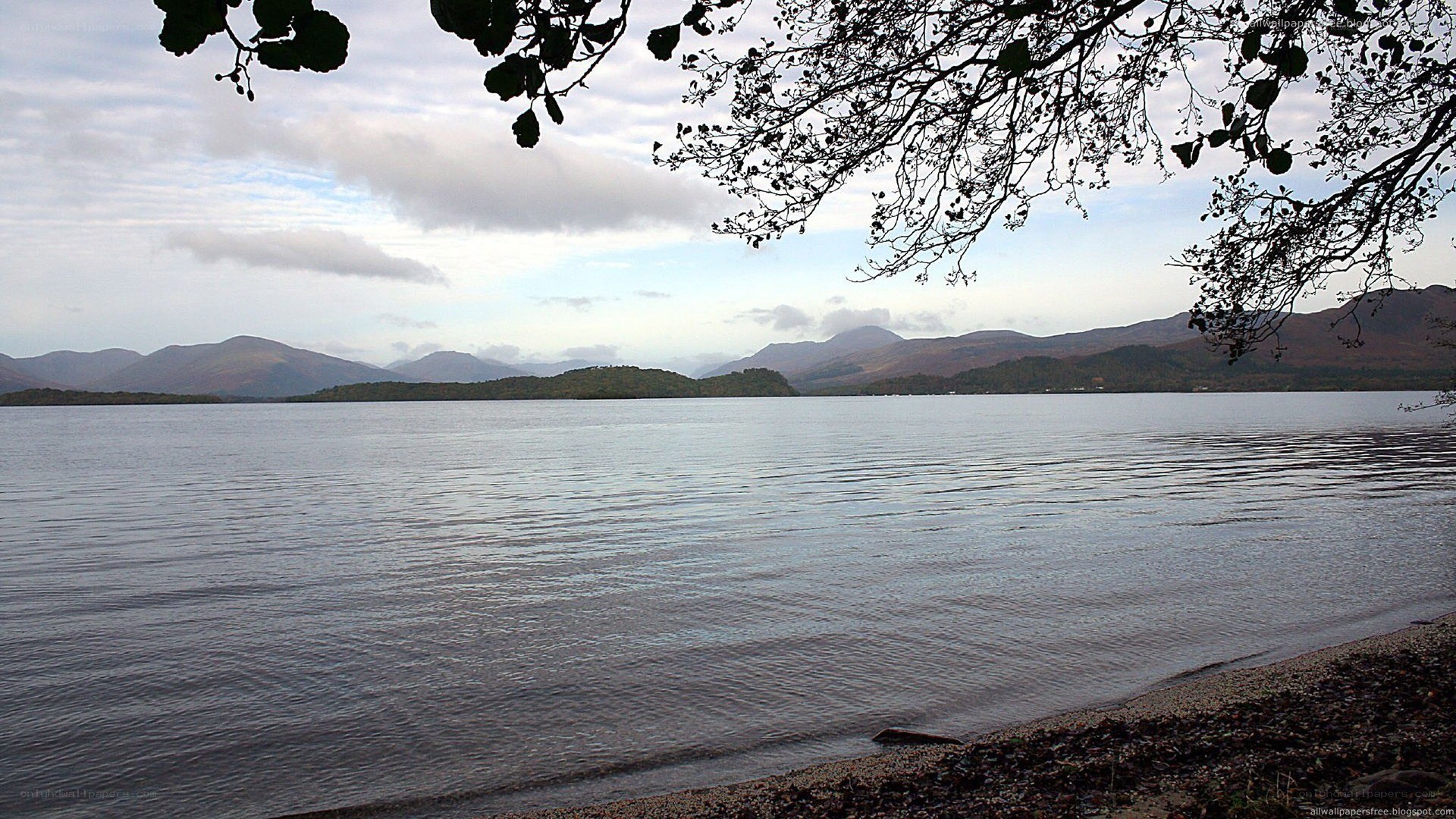 Lake with mountains in background
