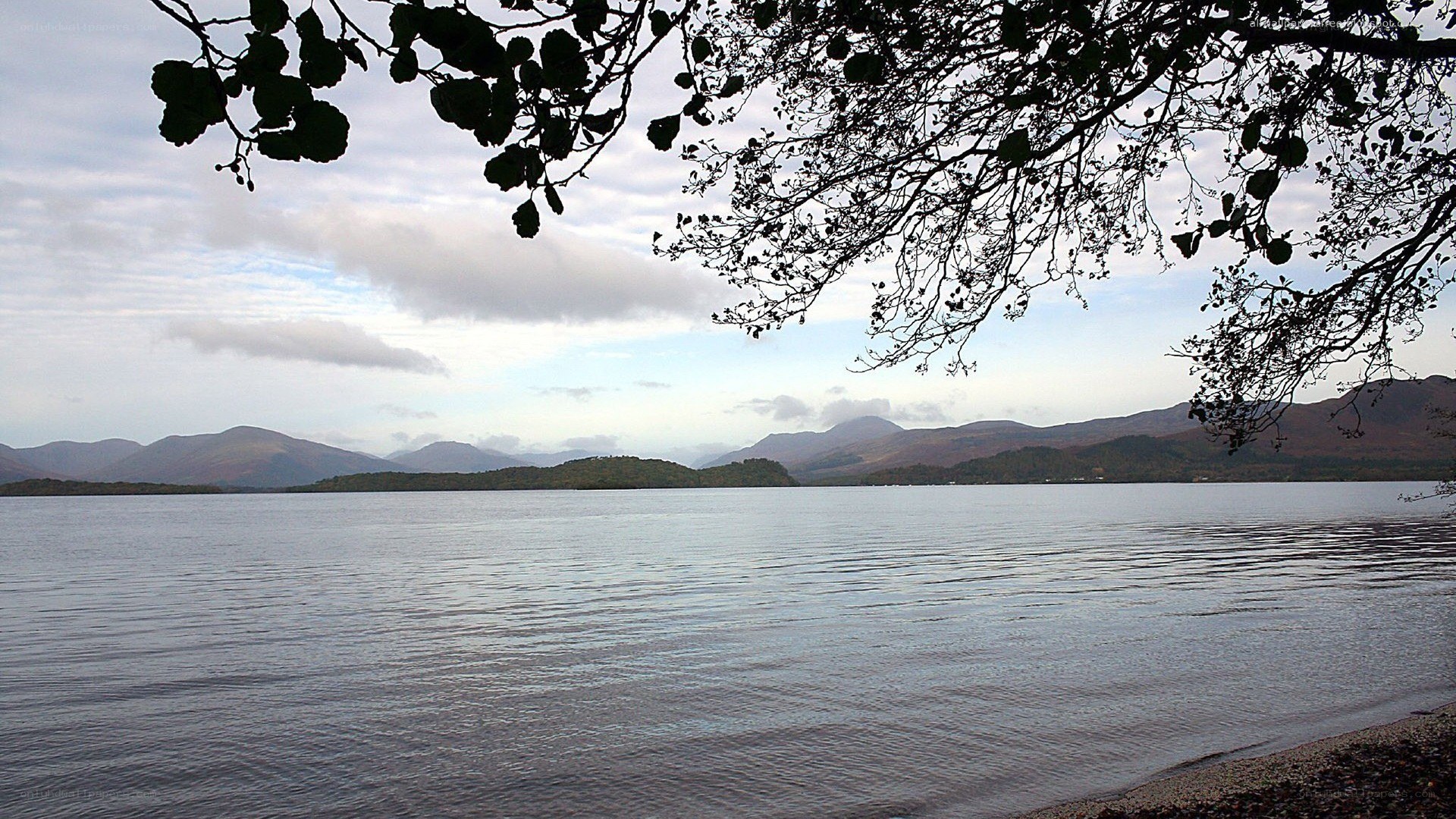 Lake with mountains in background