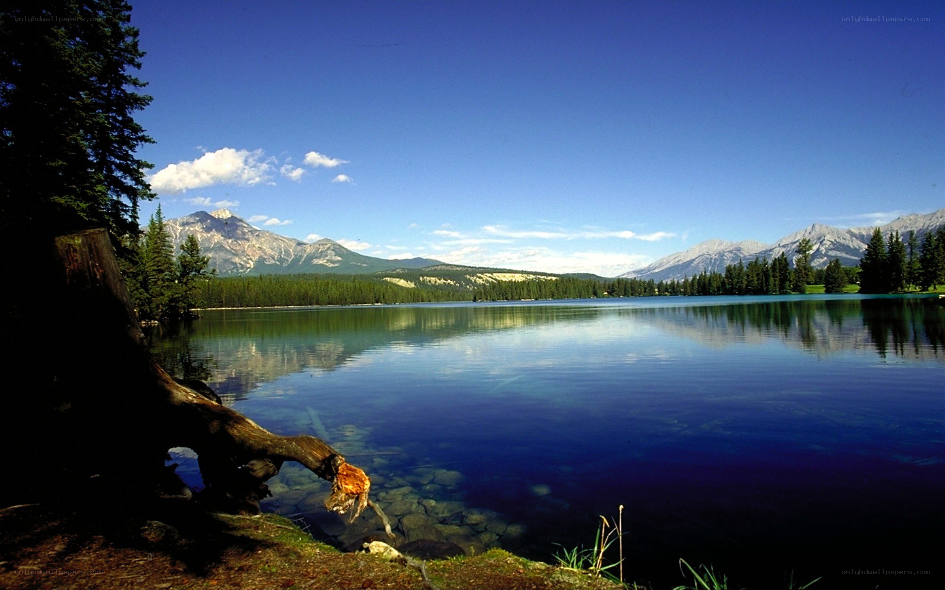 Lake with mountains in background