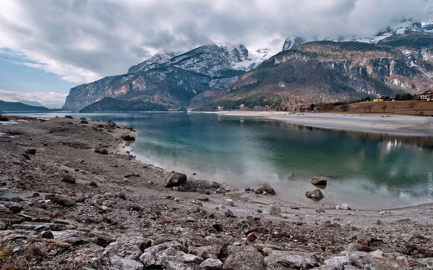 Lake with mountains in background