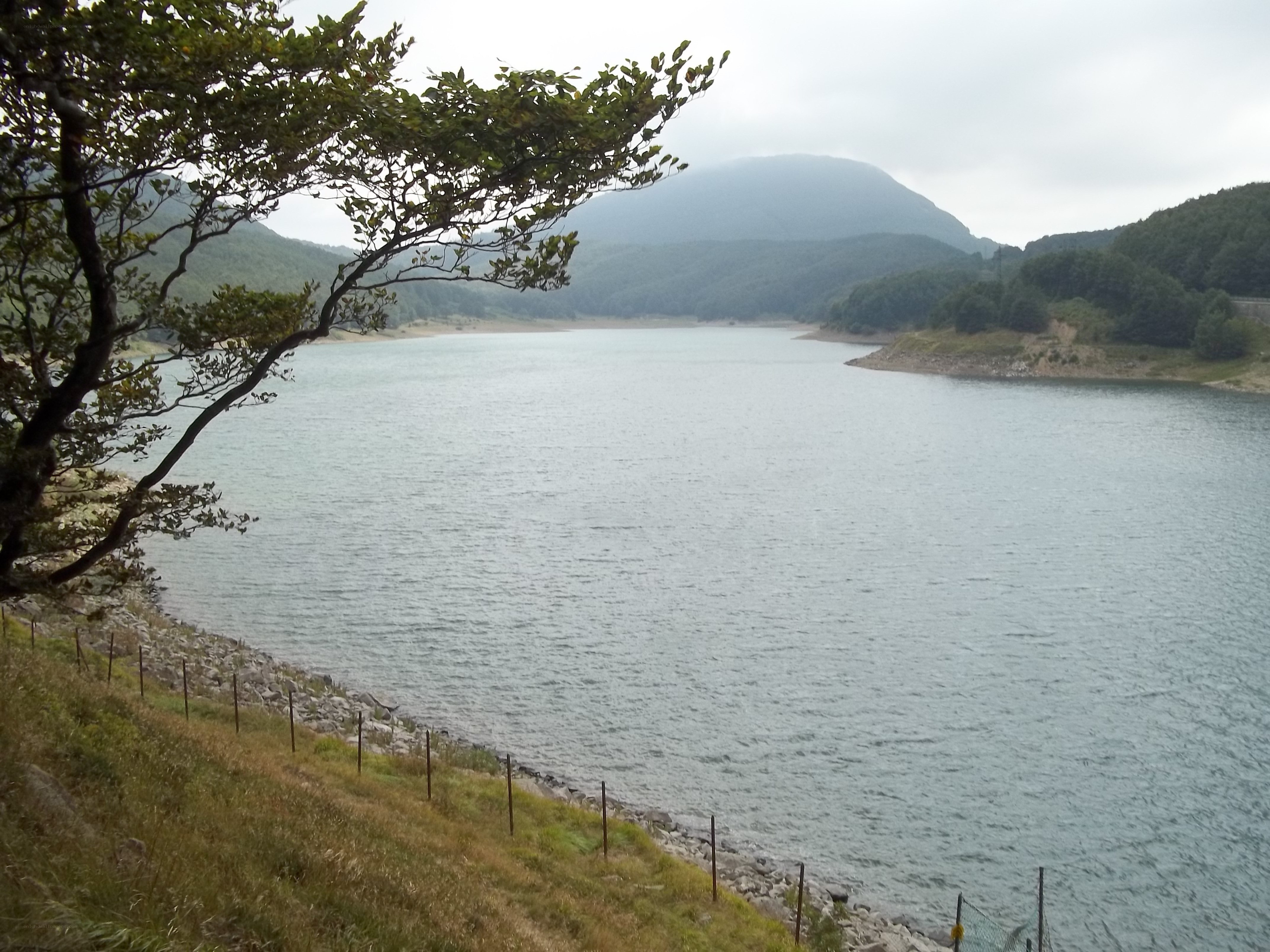 Lake with mountains in background