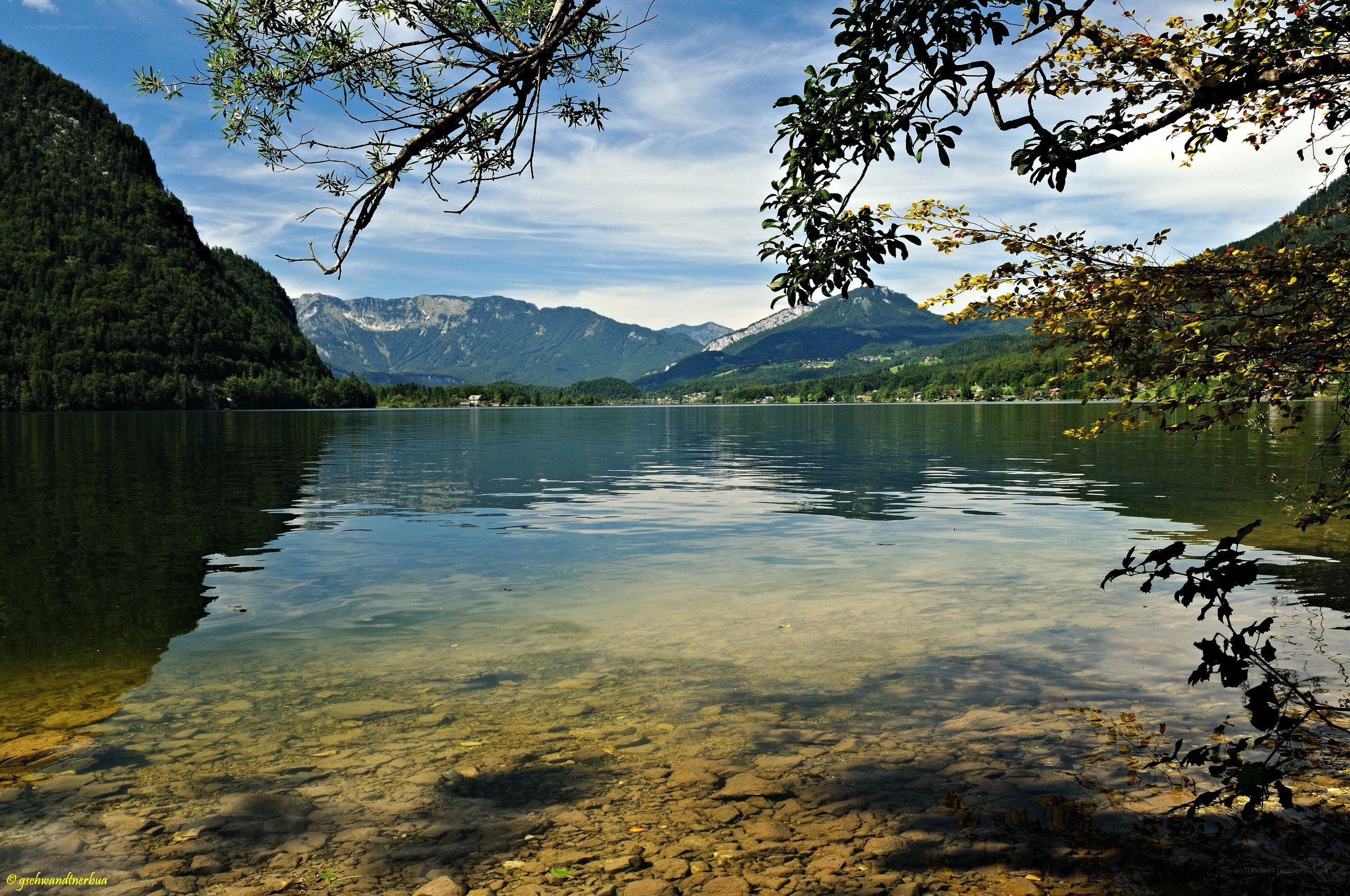 Lake with mountains in background