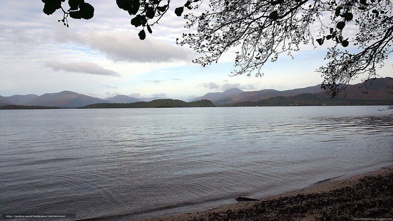 Lake with mountains in background