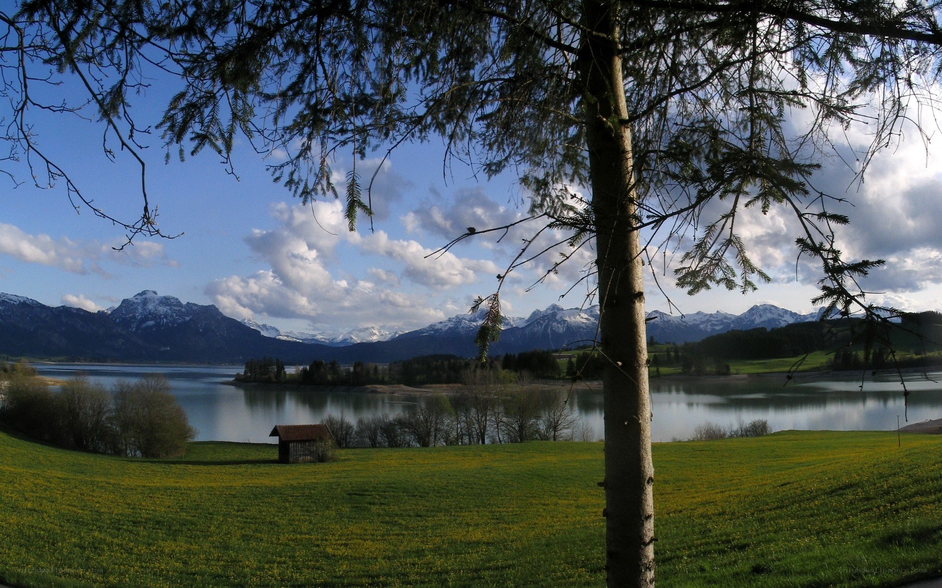 Lake with mountains in background
