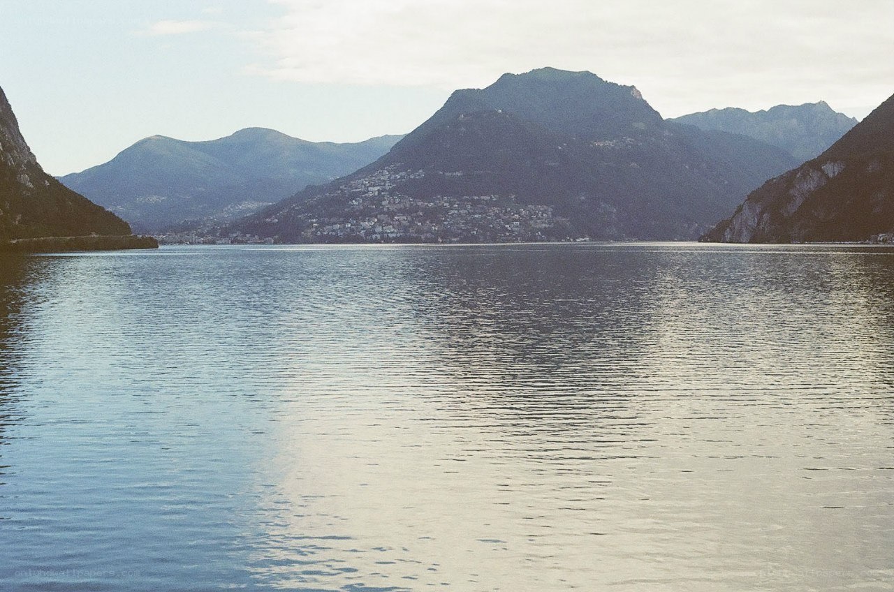 Lake with mountains in background