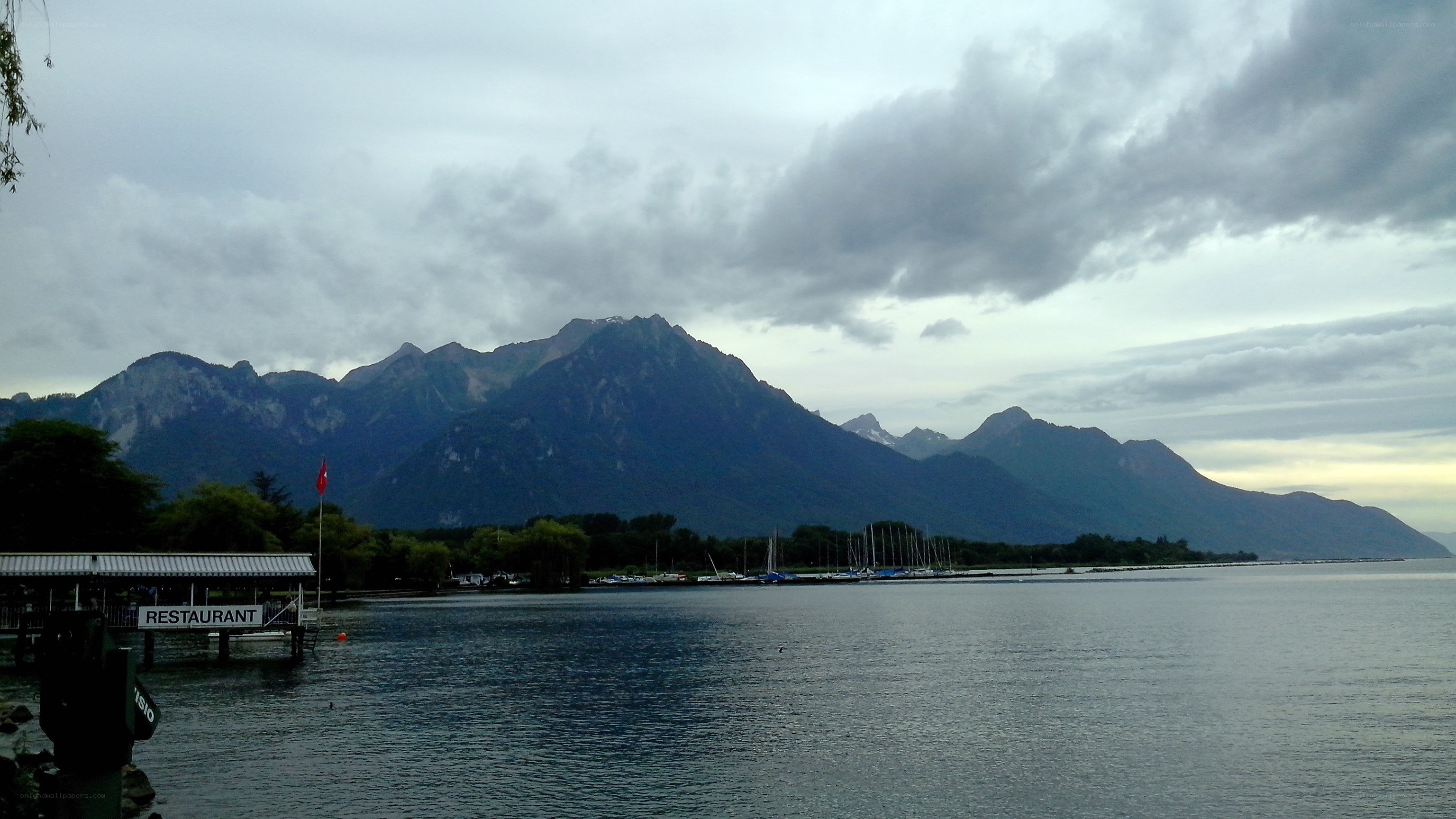 Lake with mountains in background