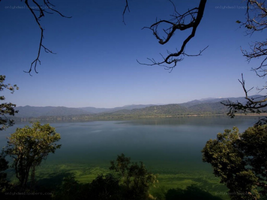 Lake with mountains in background