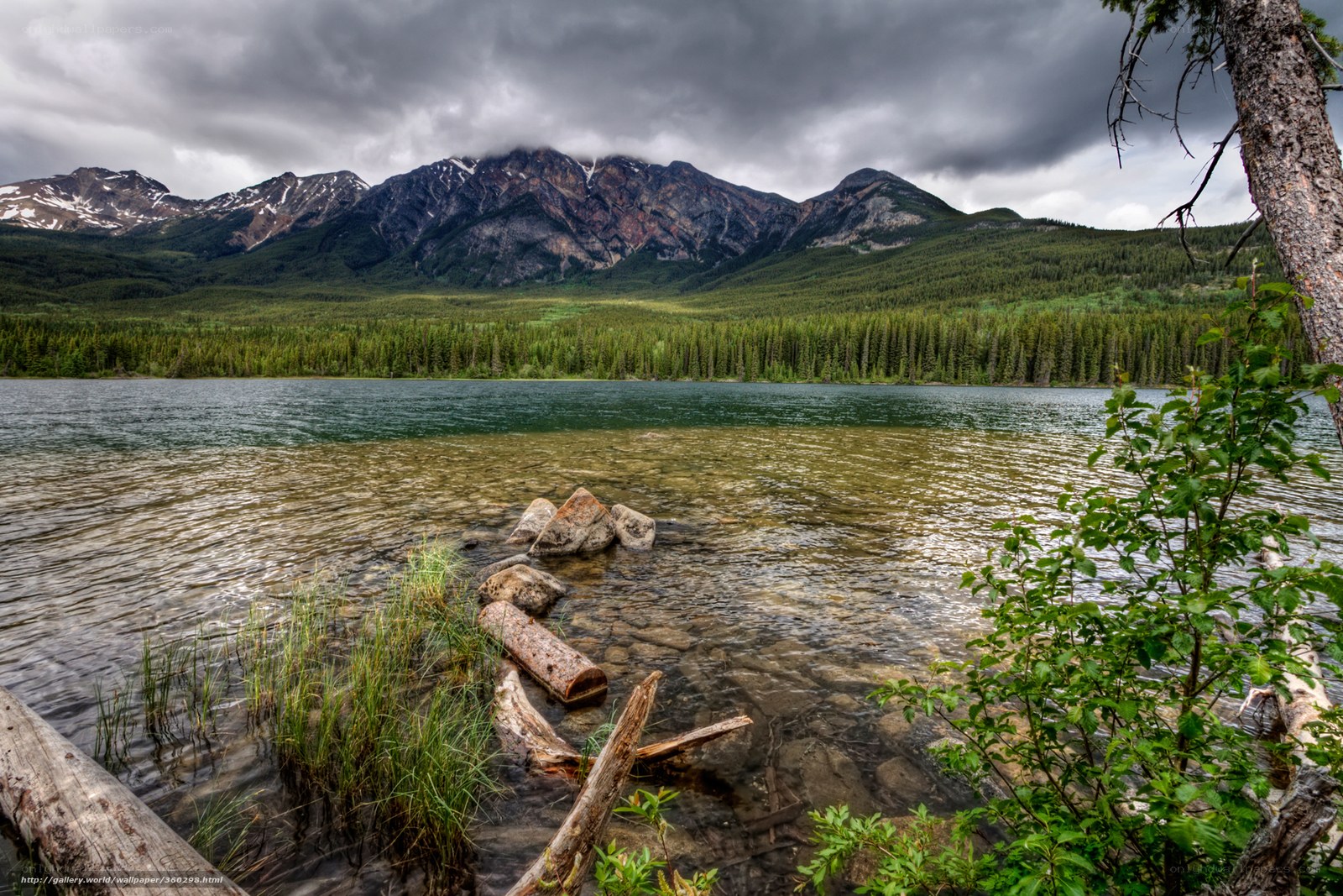 Lake with mountains in background