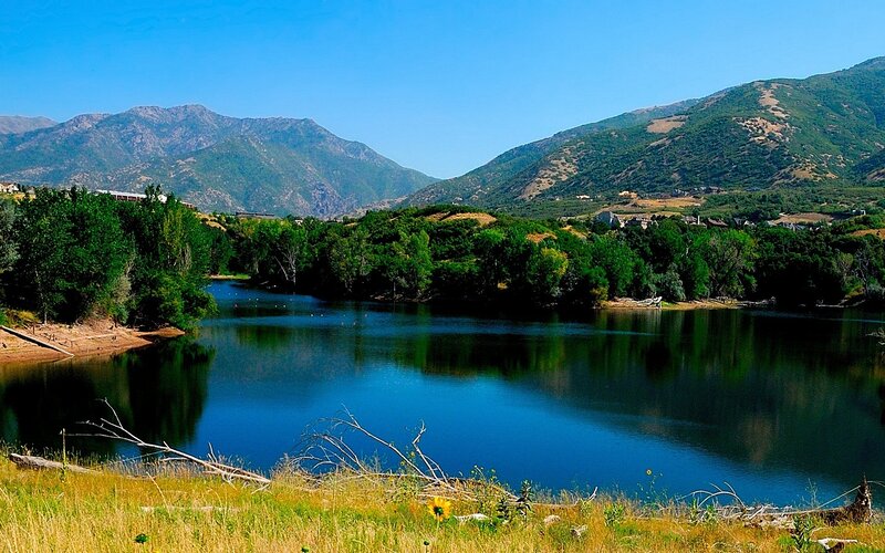 Lake with mountains in background