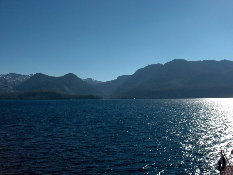 Lake with mountains in background
