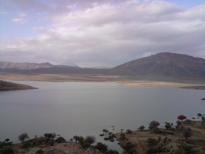Lake with mountains in background