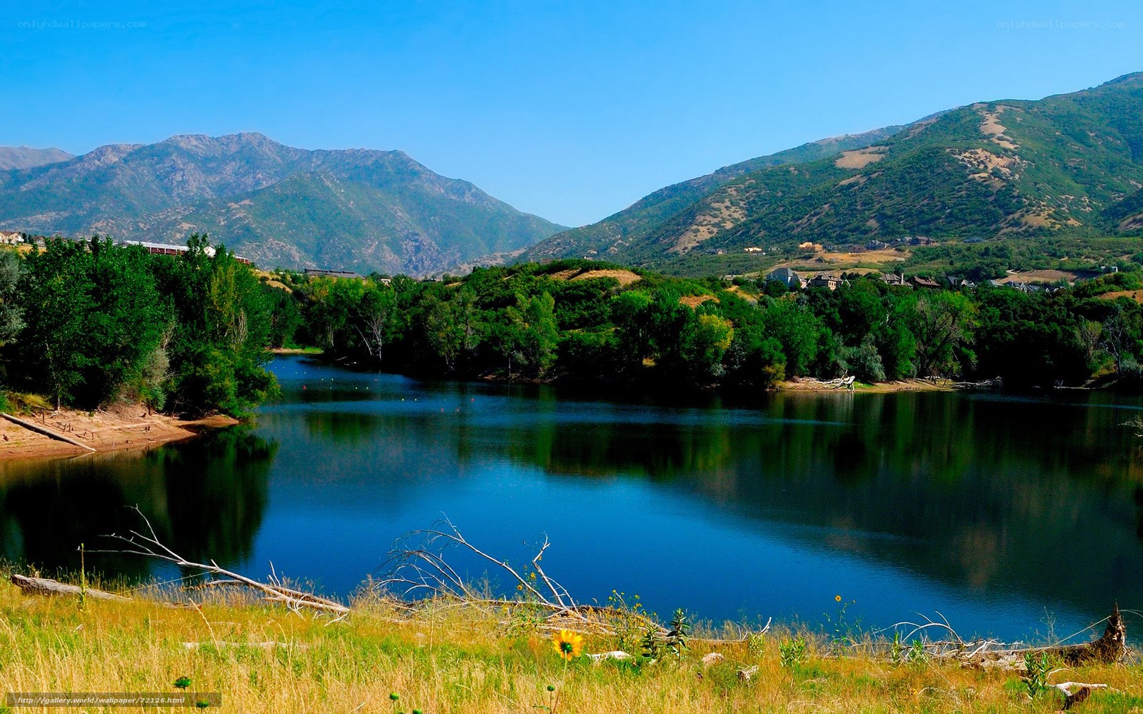 Lake with mountains in background
