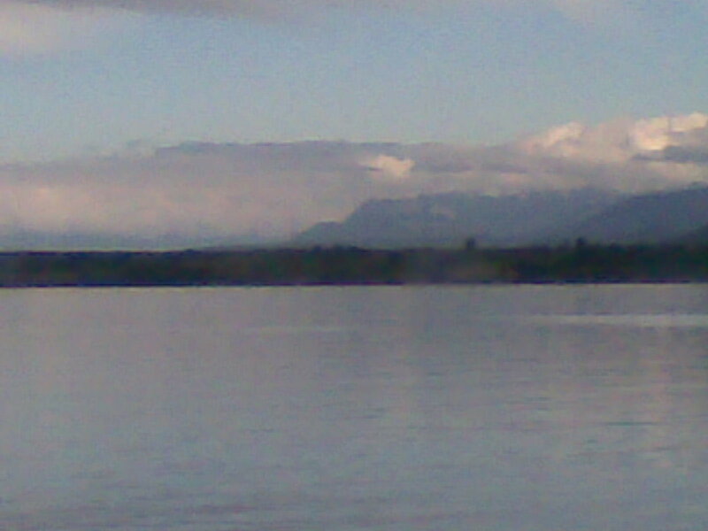 Lake with mountains in distance