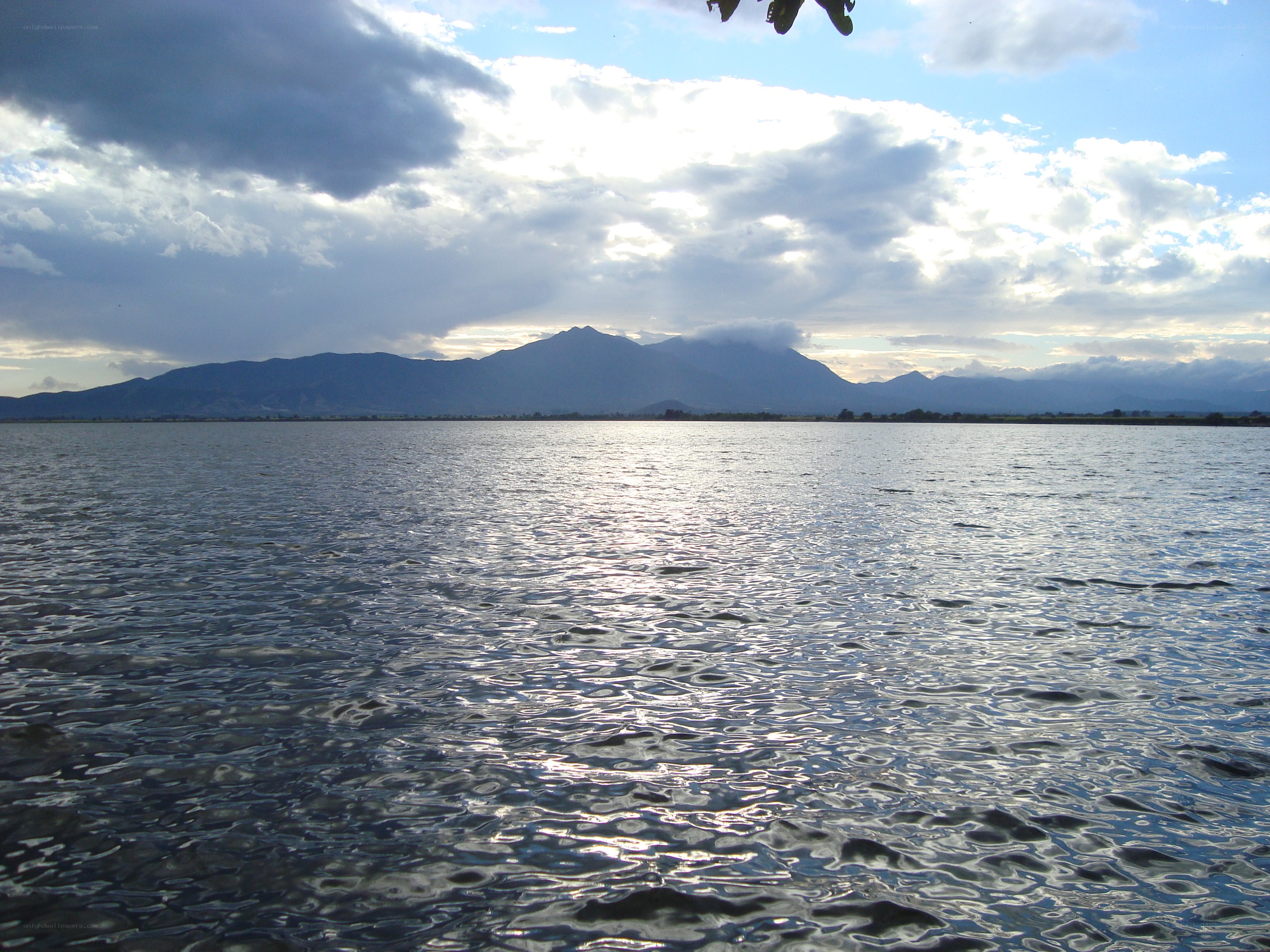 Lake with mountains in the distance