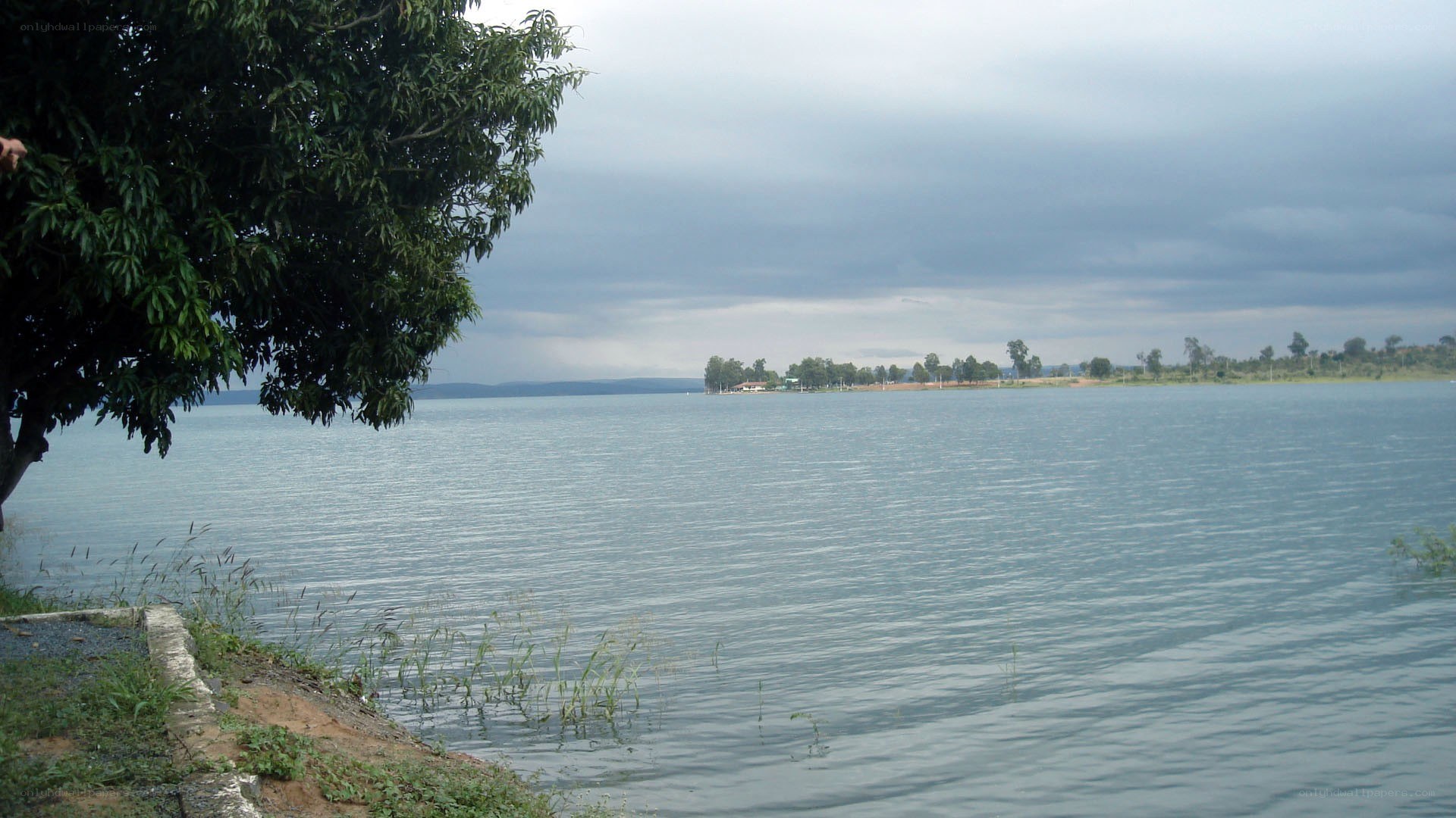Lake with overcast sky