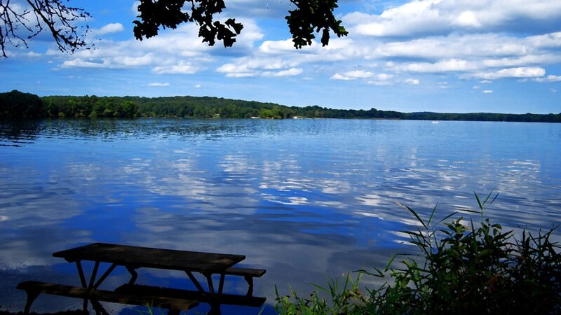 Lake with picnic table