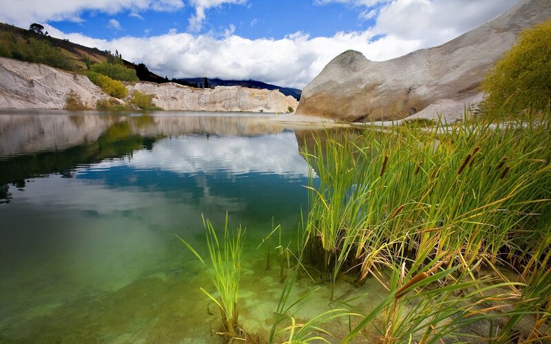 Lake with Reeds and Cliffs — Blue