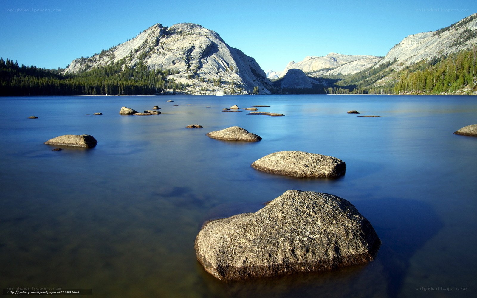 Lake with rocks and mountains