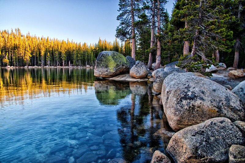 Lake with Rocks and Trees — Blue, Serene, Sunset, Photograph