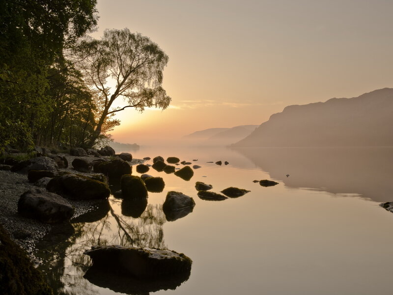 Lake with Rocks at Sunrise