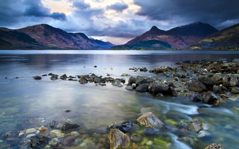 Lake with Rocky Shore — Blue, Dramatic, Sunset, Photograph, Mountains