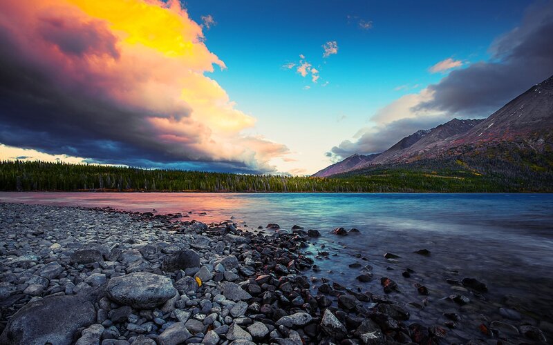 Lake with Rocky Shore — Blue, Dramatic, Sunset, Photograph