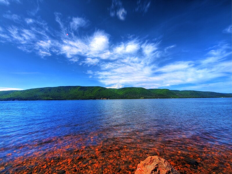 Lake with Rocky Shore — Blue, Serene, Afternoon, Photograph, Mountains, Clouds