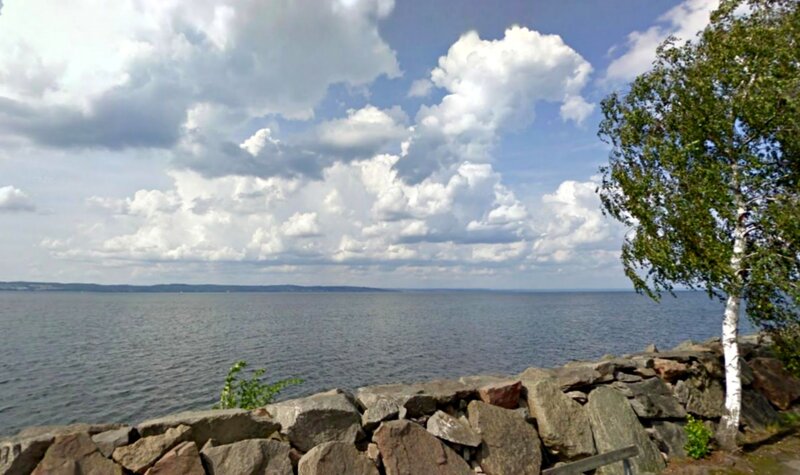 Lake with Rocky Shore — Blue, Serene, Afternoon, Photograph