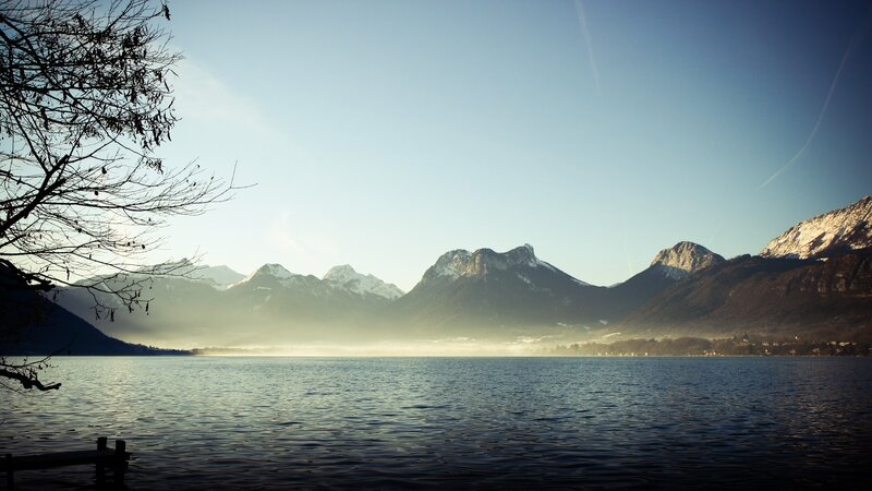 Lake with snow-capped mountains