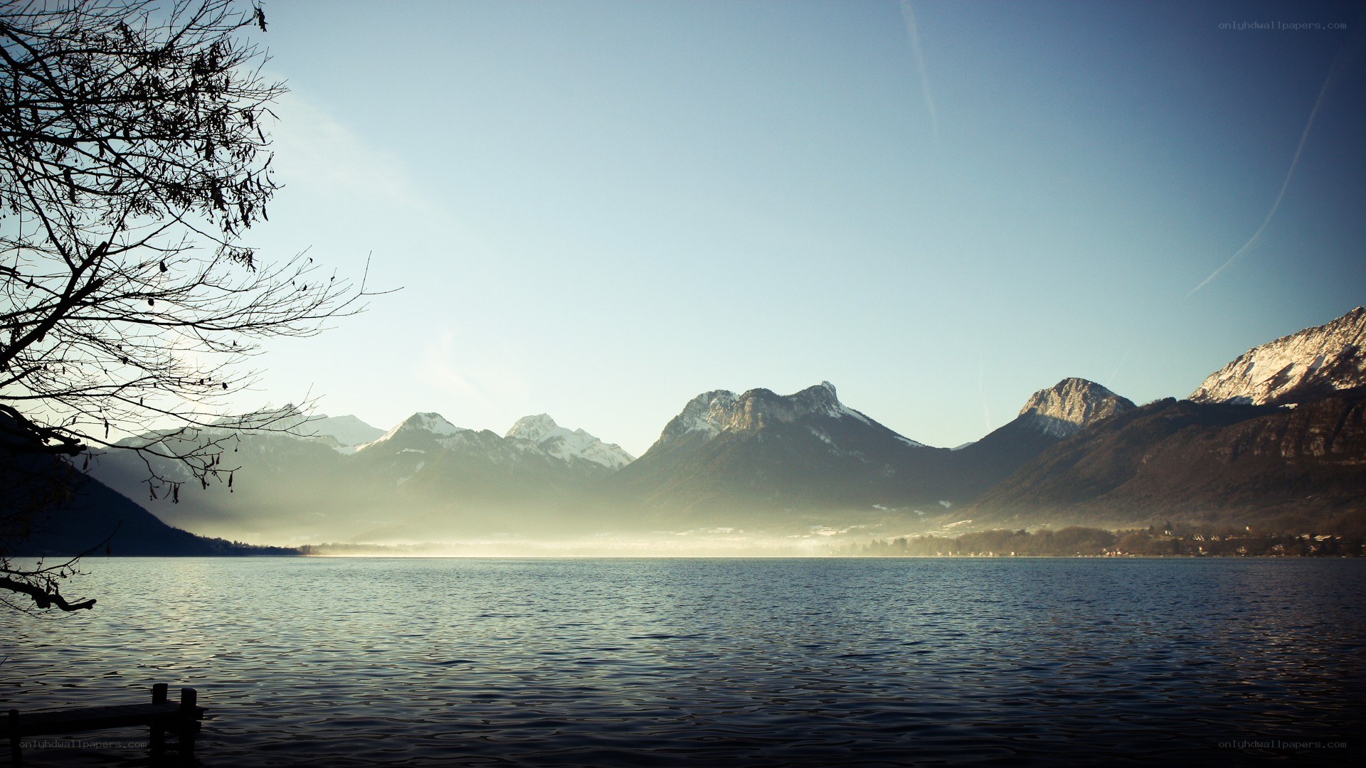 Lake with snow-capped mountains