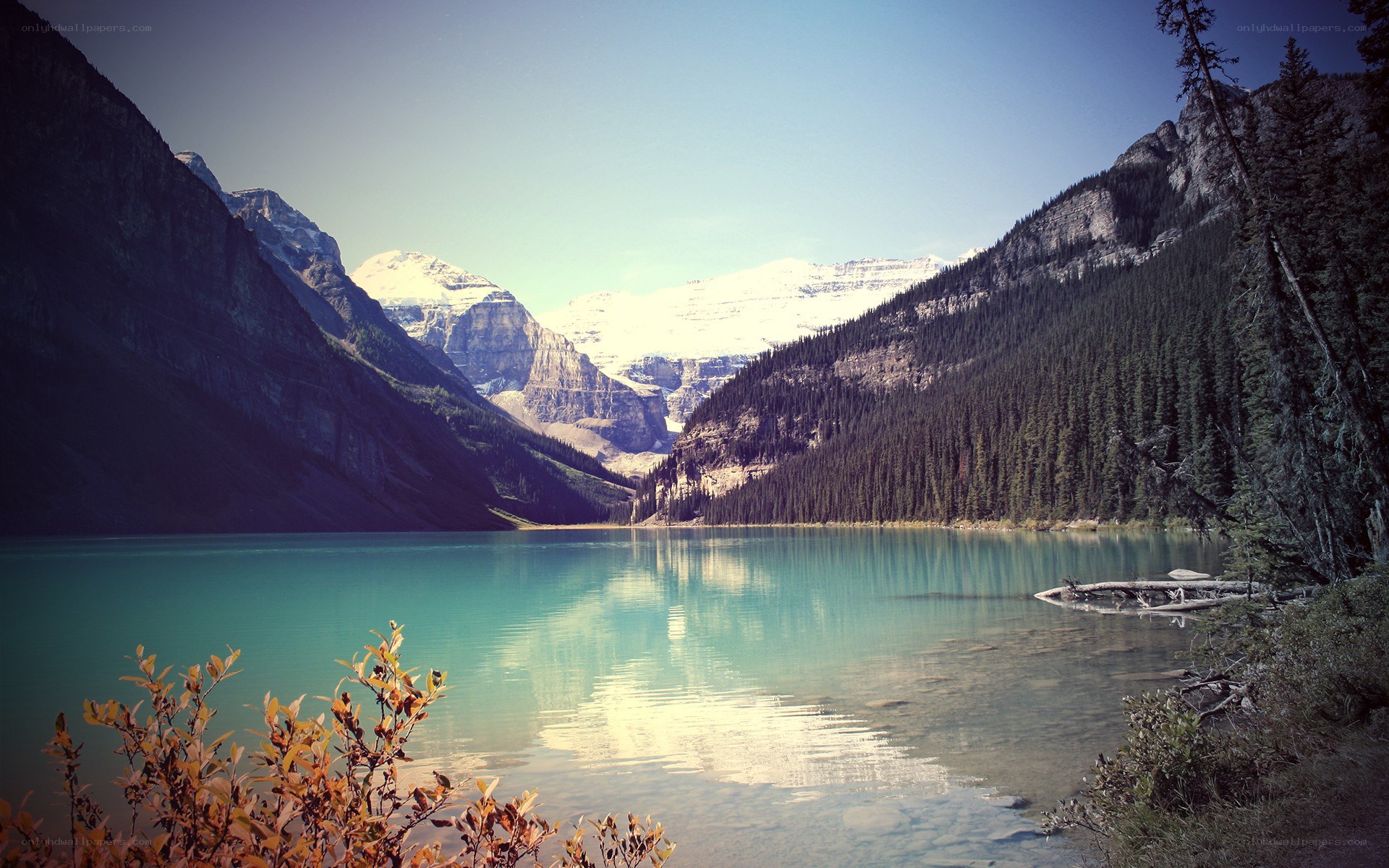 Lake with snow-capped mountains