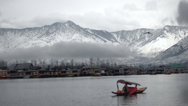 Lake with snow-capped mountains