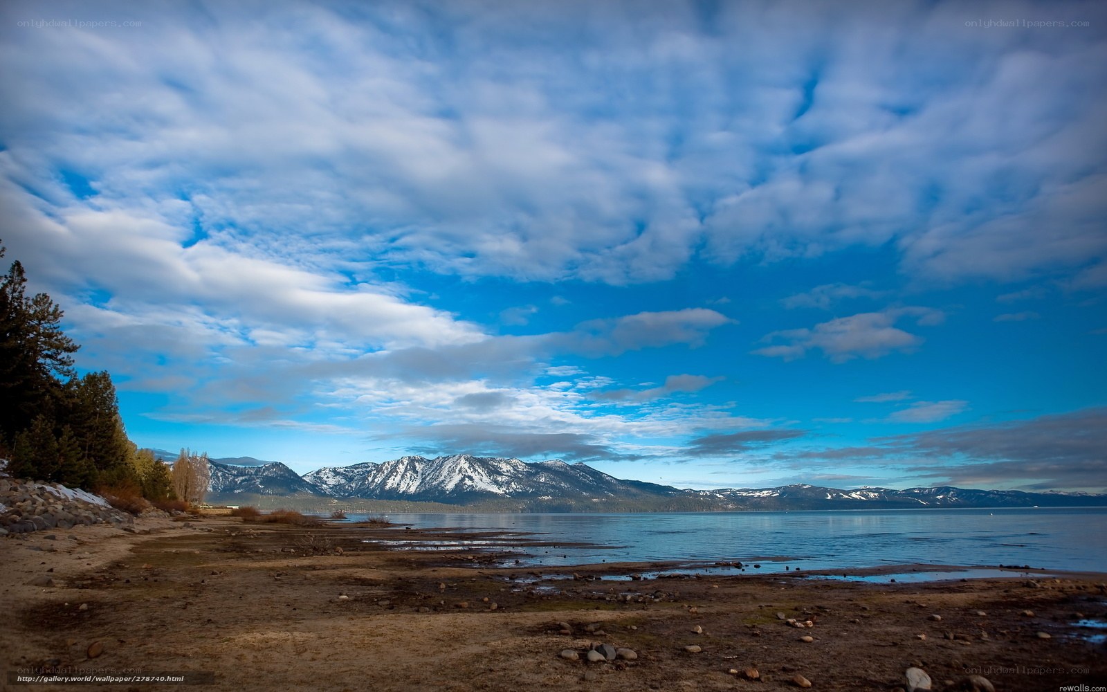 Lake with snow-capped mountains