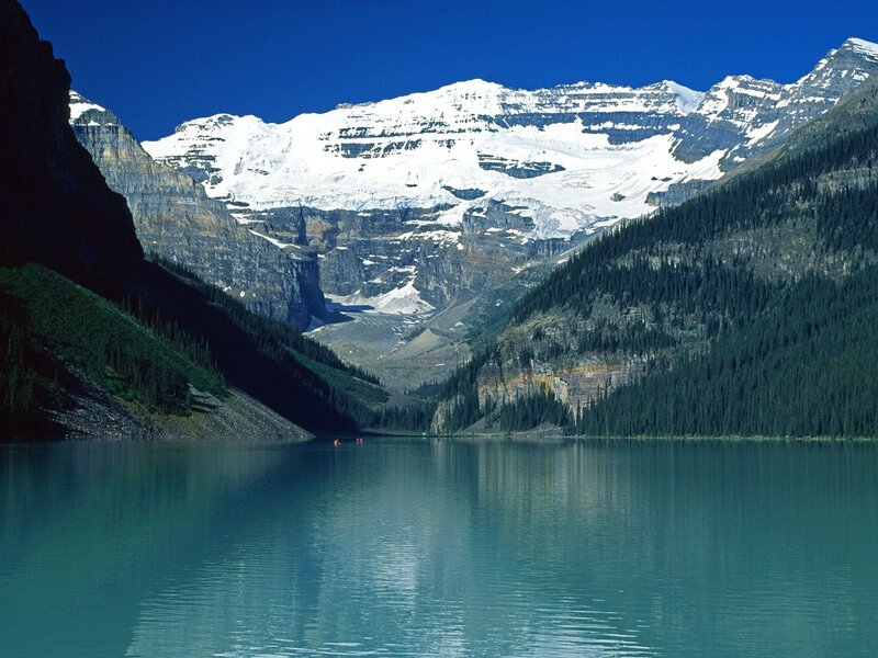Lake with snow-capped mountains