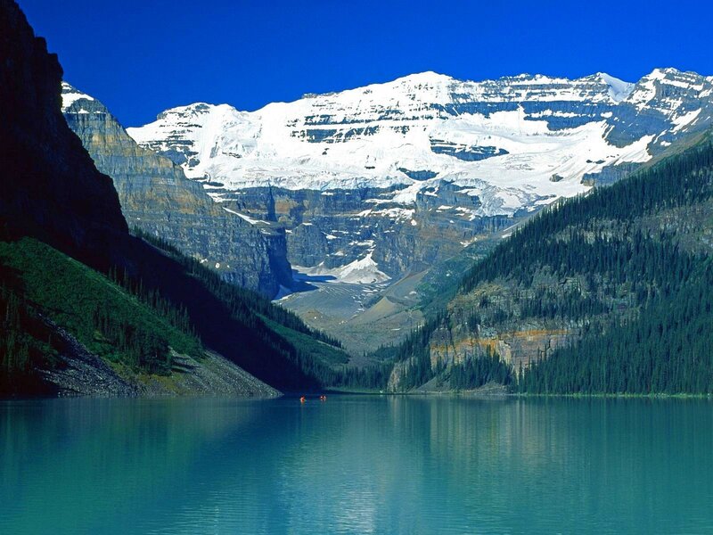 Lake with snow-capped mountains