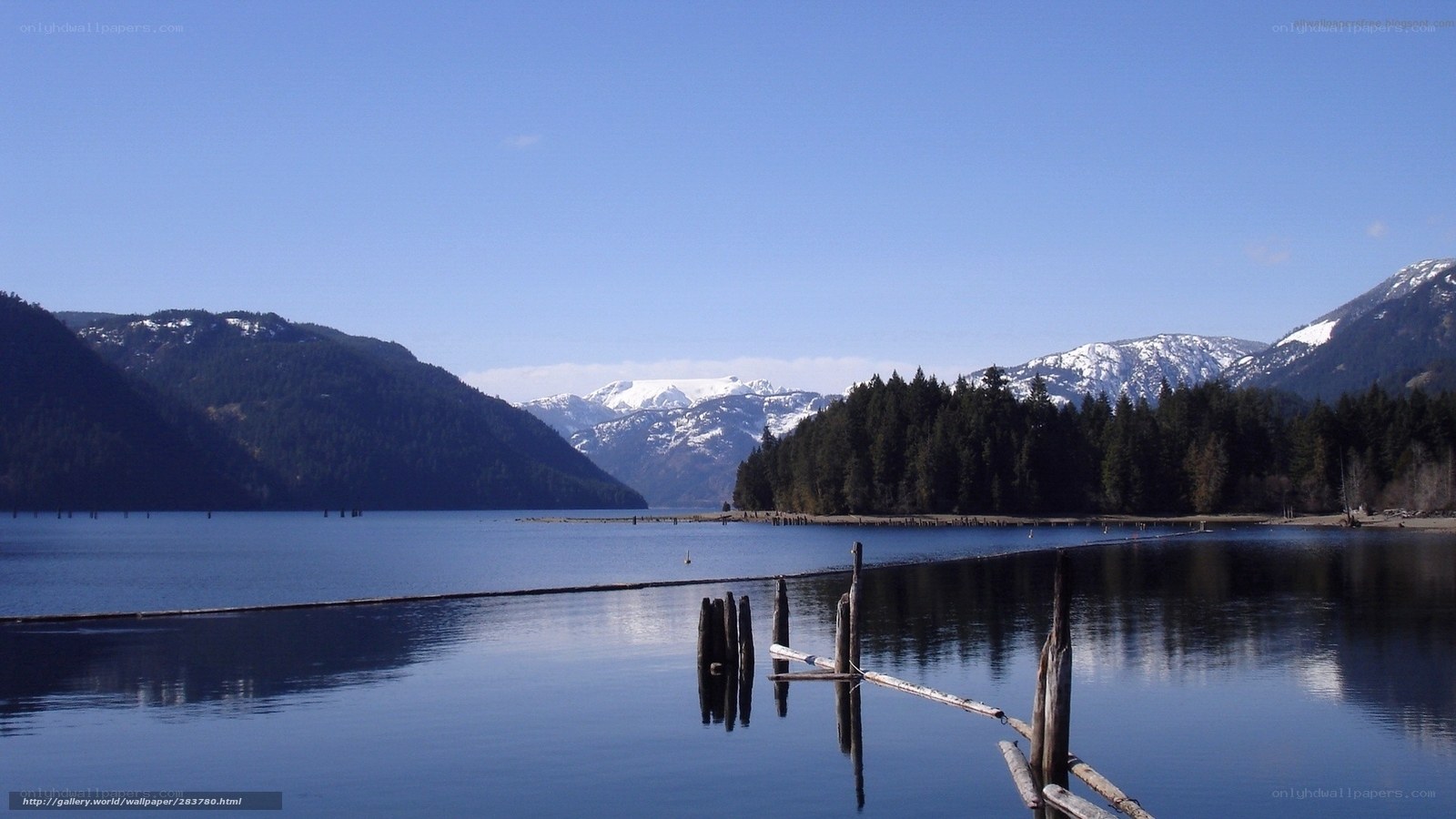 Lake with snow-capped mountains