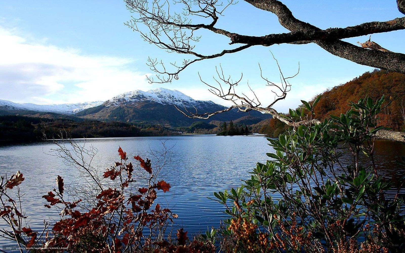 Lake with snow-capped mountains