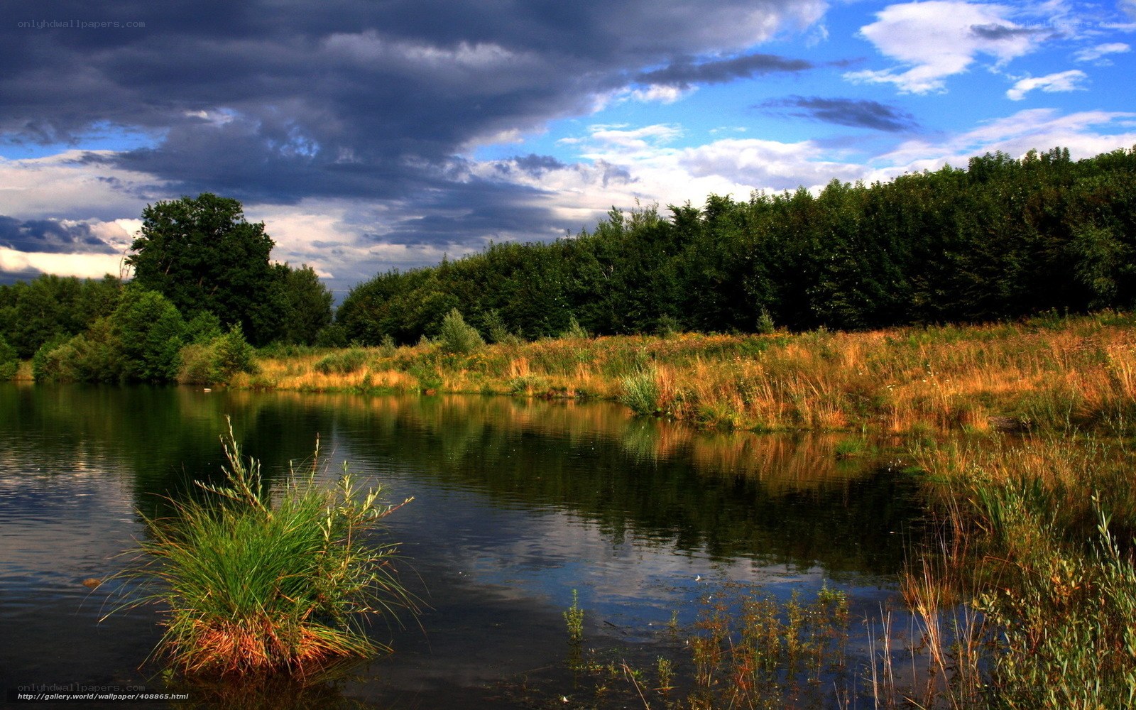 Lake with stormy sky