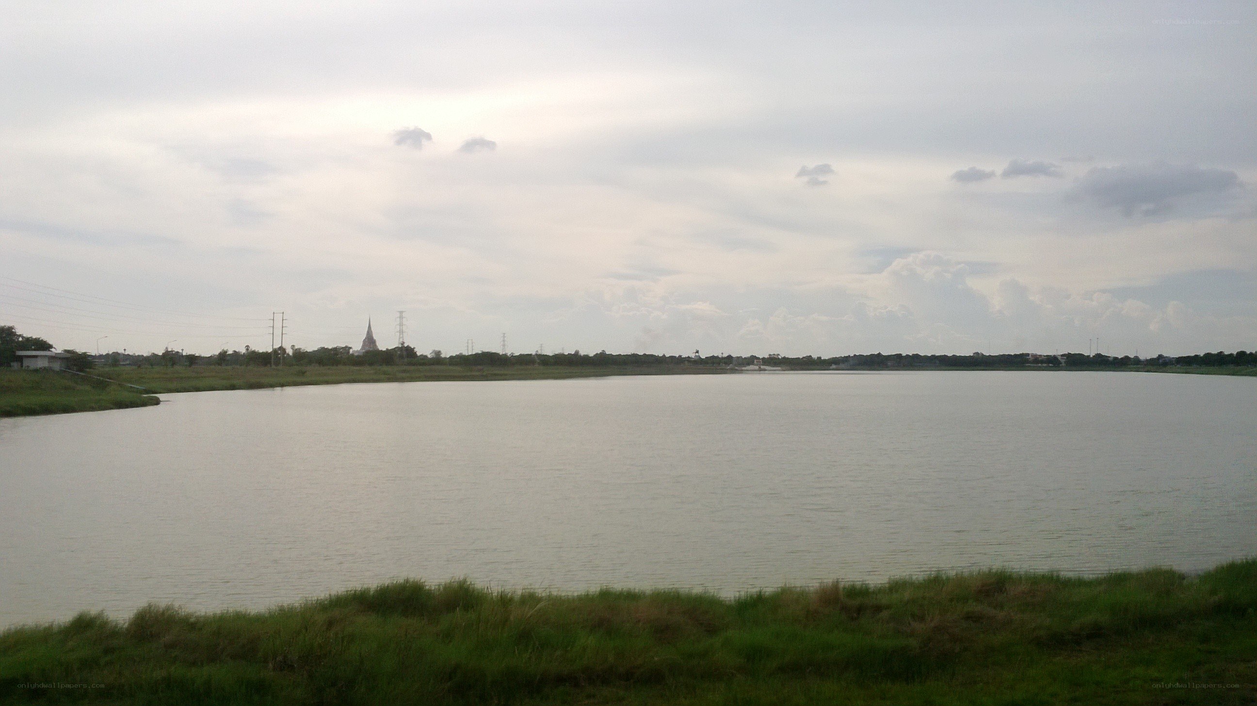 Lake with temple in distance