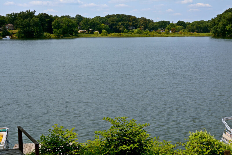 Lake with Trees and Boats — Green