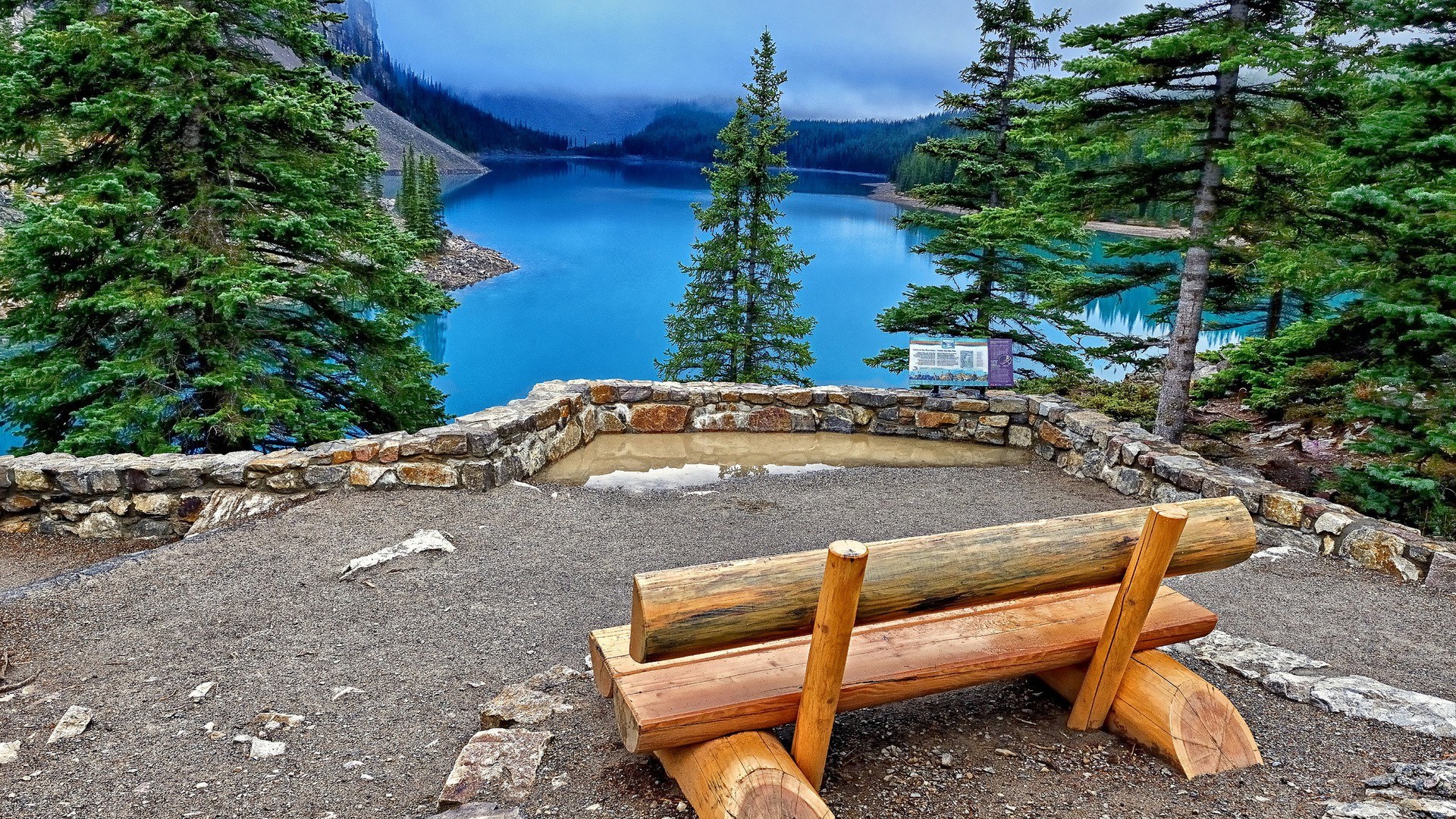 Lake with wooden bench